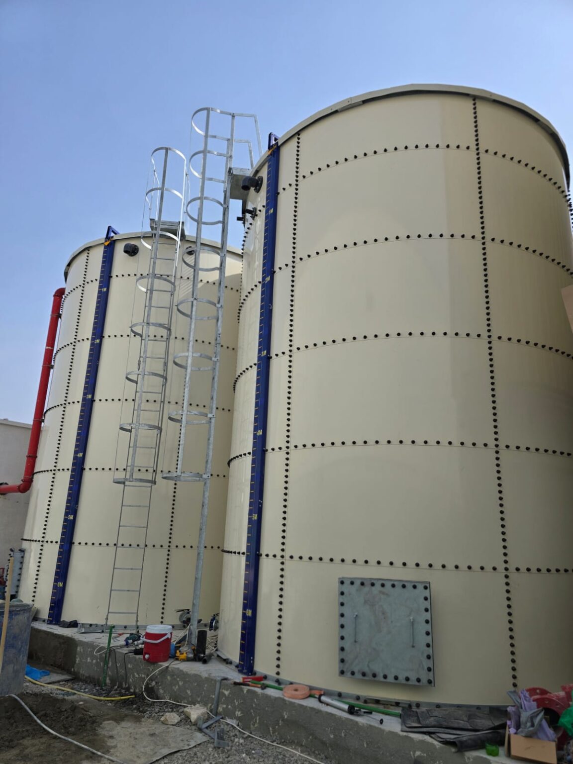 Custom sectional steel water tank manufacturing at the Al Karwan Solution FZC facility in Sharjah, UAE